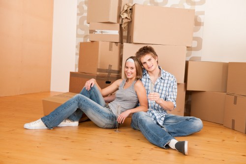 Organized moving boxes and storage items in a Romford property