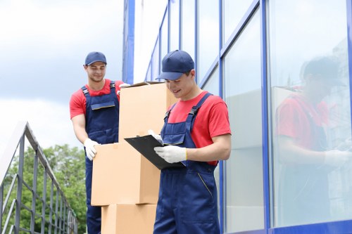 Professional house removals in Romford with packed moving boxes