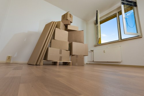 Careful packing of fragile household items by Romford movers