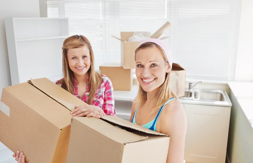 House removals in Romford with movers handling stairs and large items